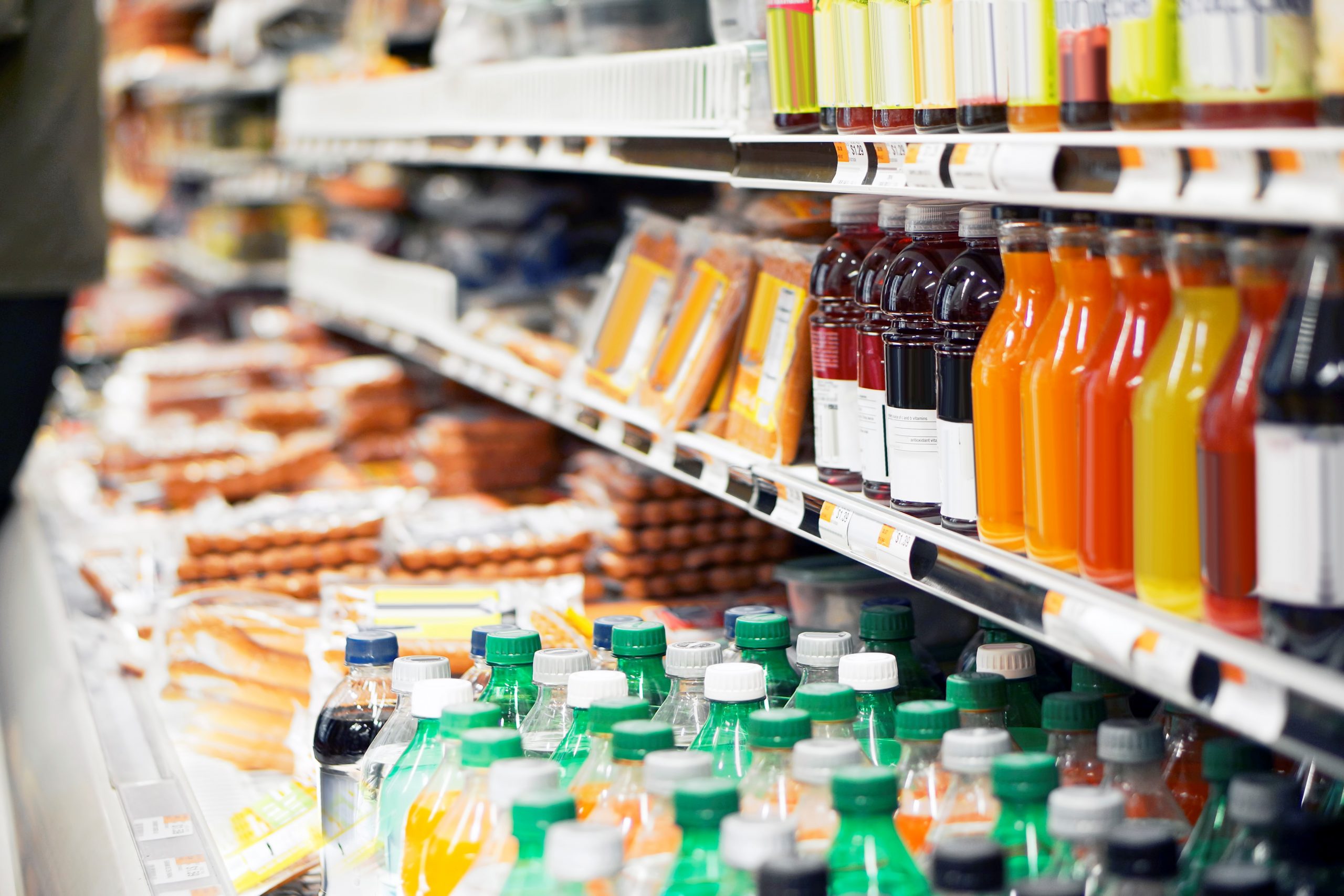 Refrigerated foods in store, including chilled drinks and food.
